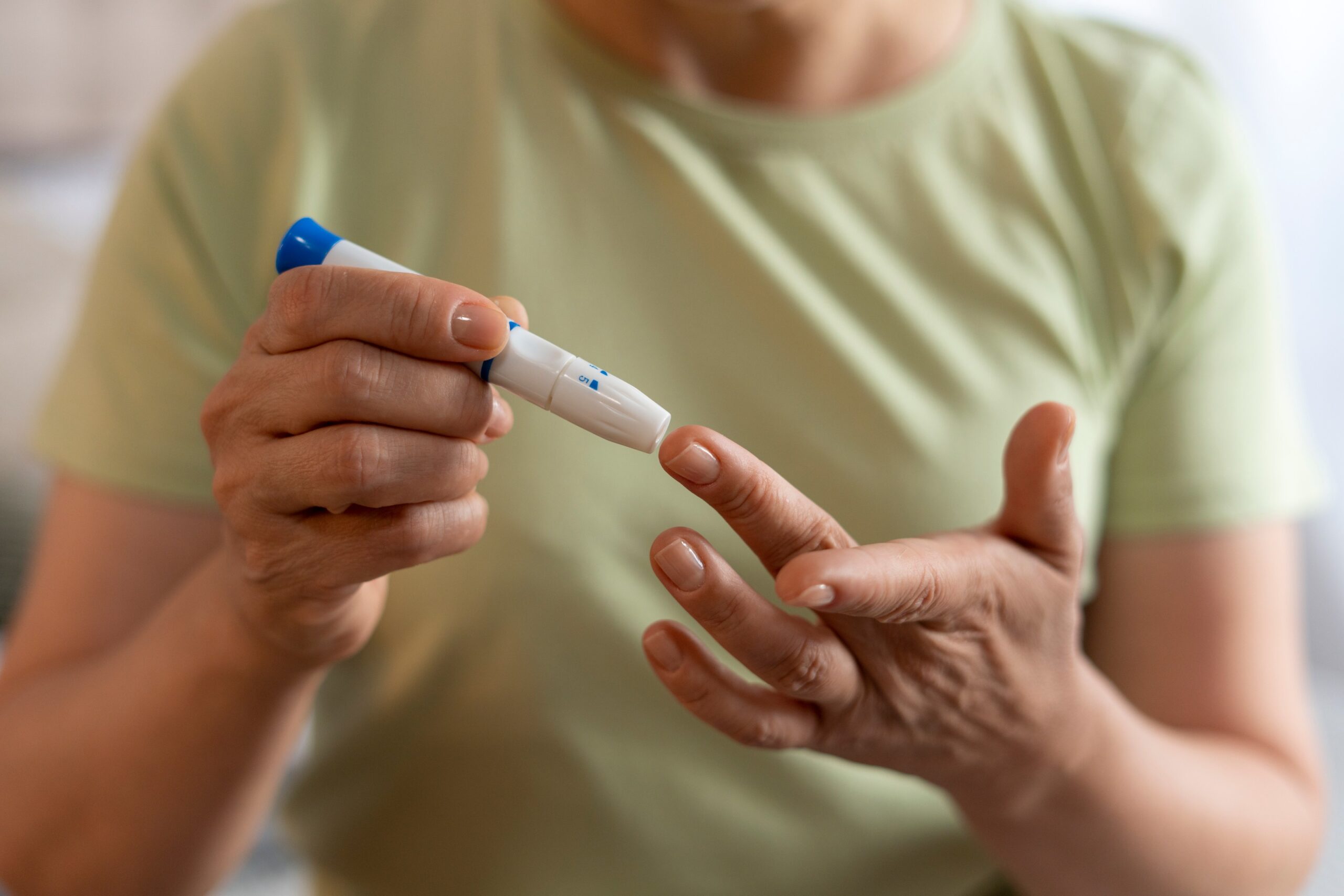 front-view-diabetic-woman-checking-her-glucose-level (1)